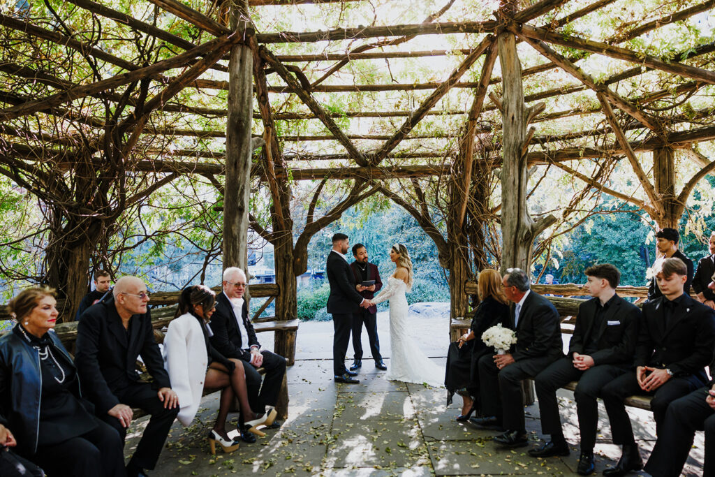 Couple elopes at Cop Cot in Central Park, NYC.