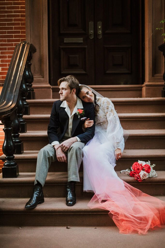 Stunning late summer bride wears ombre style veil that matches her bouquet at NYC elopement.