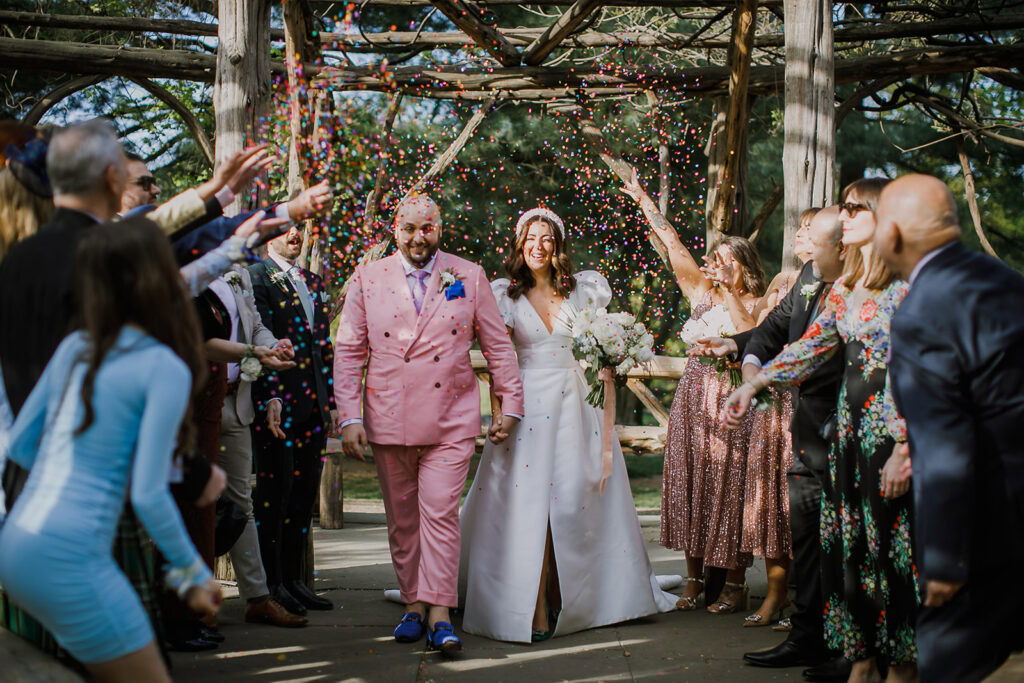 Couple elopes in intimate micro-wedding at Cop Cot, Central Park, NYC.