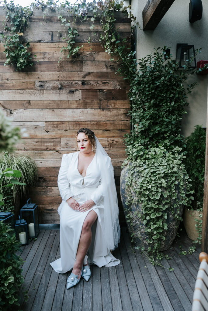Elopement bride poses at 1 Hotel Central Park in New York City.