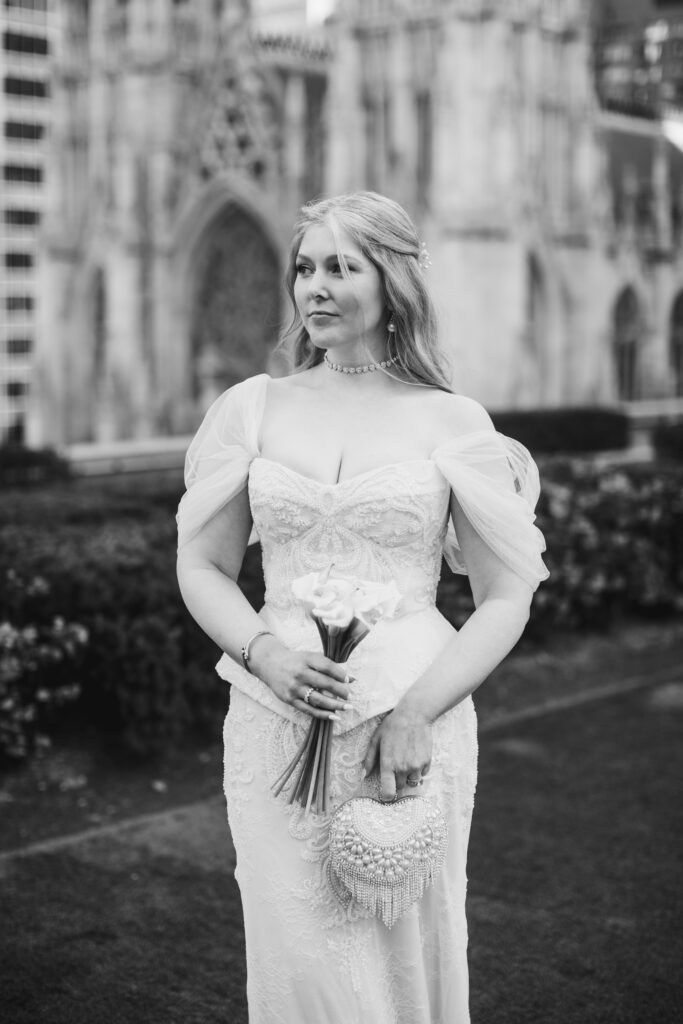 Bride poses for elopement photos at 620 Loft and Garden in NYC.